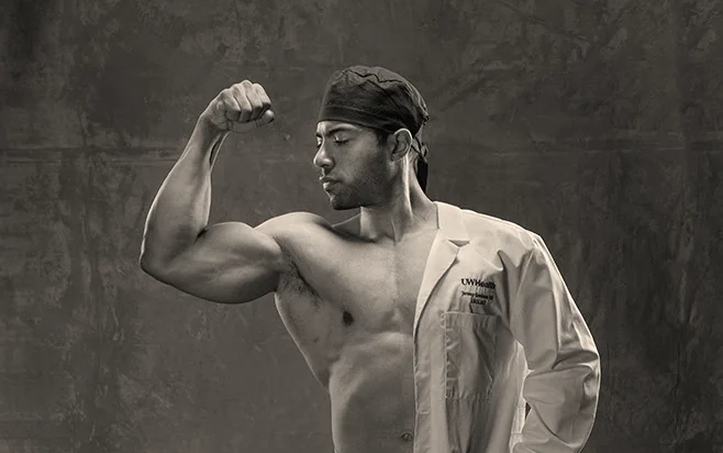 Dr. Jeremy Goodman as a urology resident, half in his University of Wisconsin lab coat
